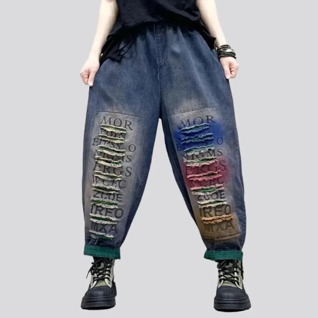 Distressed women's denim pants